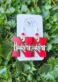 Huskers Dangles
